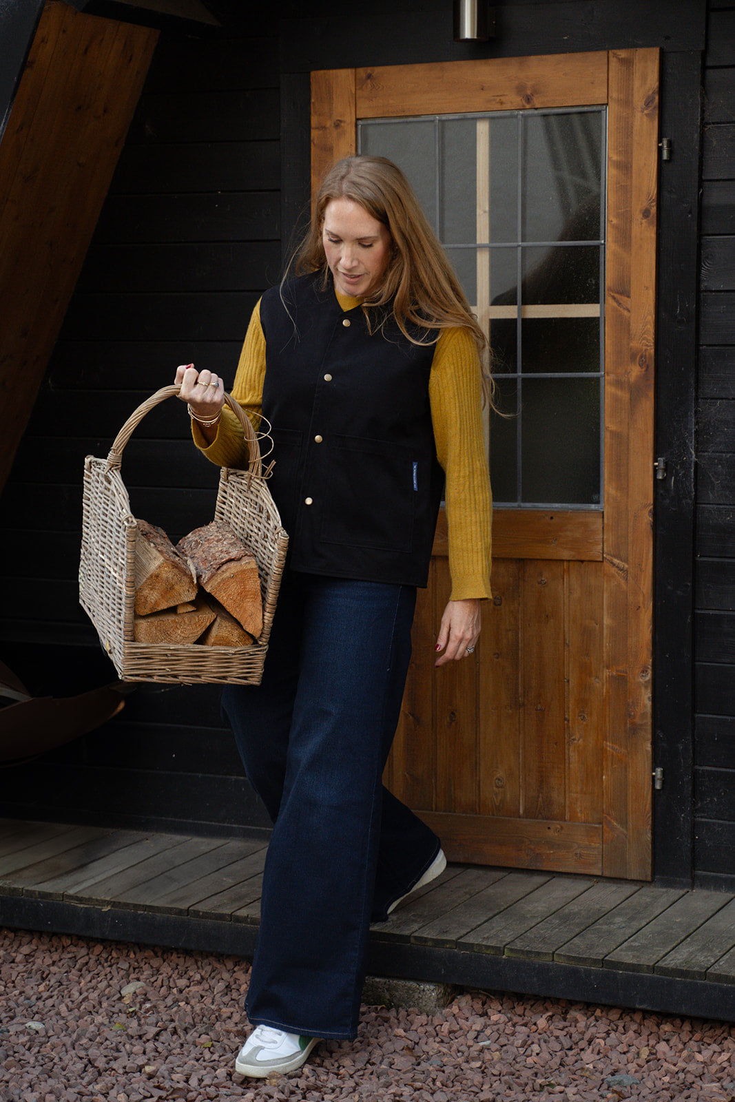 Emily wearing black liner vest by Borthwick